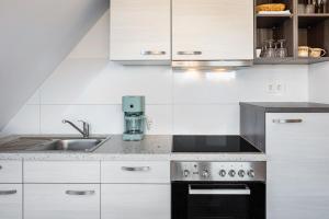 Kuchyň nebo kuchyňský kout v ubytování Gästehaus - Im Gärtle