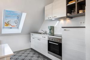 Kuchyň nebo kuchyňský kout v ubytování Gästehaus - Im Gärtle