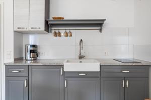 Kuchyň nebo kuchyňský kout v ubytování Gästehaus - Im Gärtle