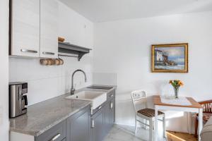 Kuchyň nebo kuchyňský kout v ubytování Gästehaus - Im Gärtle