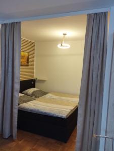Katil atau katil-katil dalam bilik di Ferienwohnung Leinetal