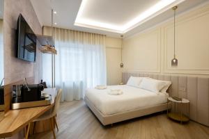 Postel nebo postele na pokoji v ubytování Eudora Guesthouse Roma