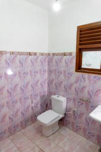 Ένα μπάνιο στο Nandana Guest House +3 φωτογραφίες