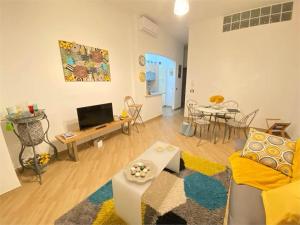 a living room with a couch and a table at Casa Anacleto in Iglesias