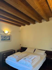 A bed or beds in a room at Apartment Giulia
