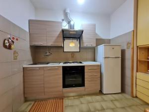 Kuchyň nebo kuchyňský kout v ubytování Appartamento I Rondinelli + 10 fotografií