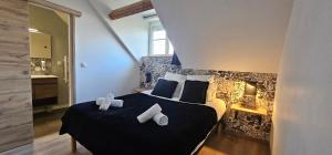 Postel nebo postele na pokoji v ubytování Le Clos Maldier - Gîte de la Belle vue