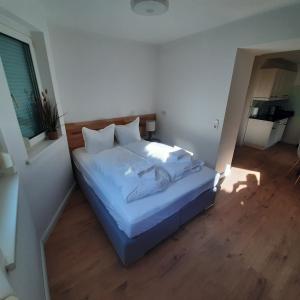 Postel nebo postele na pokoji v ubytování Center Apartments Bludenz