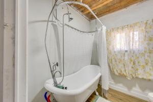 a bathroom with a shower and a toilet and a sink at Winnsboro Home on 17 Acres Outdoor Spots and Trails in Winnsboro +20 photos