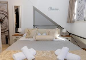 Ένα ή περισσότερα κρεβάτια σε δωμάτιο στο Central Split rooms and apartments Paese