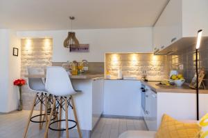 Η κουζίνα ή μικρή κουζίνα στο Central Split rooms and apartments Paese