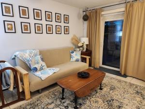 a living room with a couch and a coffee table at 3BR Oasis with Pool in Cocoa in Cocoa