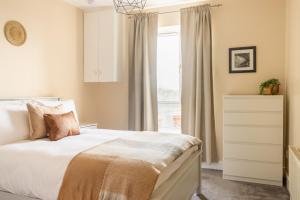 Katil atau katil-katil dalam bilik di GuestReady - Charming flat in Phibsborough