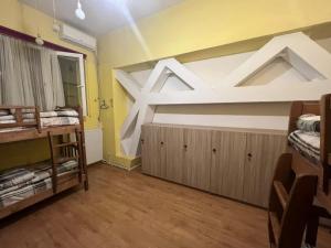 Voodi või voodid majutusasutuse Galaxy Hostel toas
