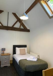 Voodi või voodid majutusasutuse Worcester semi rural bungalow with off road parking toas