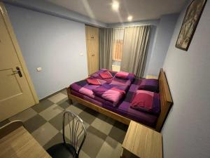 Voodi või voodid majutusasutuse Galaxy Hostel toas