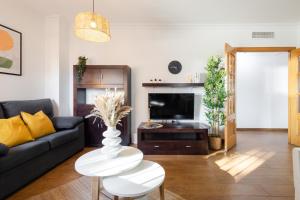 Televízia a/alebo spoločenská miestnosť v ubytovaní Nordik Apartments Village - La Cala "Raseborg"