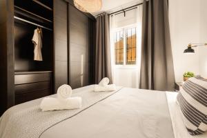 Posteľ alebo postele v izbe v ubytovaní Nordik Apartments Village - La Cala "Raseborg"