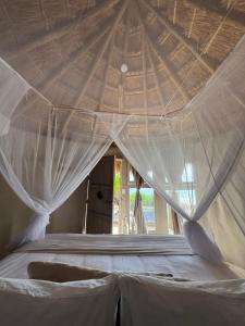 Postel nebo postele na pokoji v ubytování Art Village Tulum