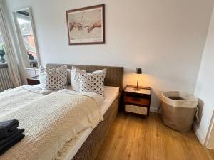 En eller flere senge i et værelse på Beachfront Escape - Teil der HolidayEscapes Kollektion + 12 billeder