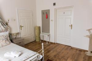 Posteľ alebo postele v izbe v ubytovaní Hotel Napoleon