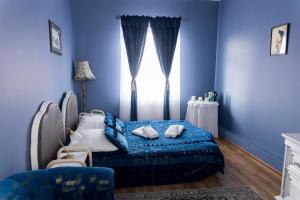 Posteľ alebo postele v izbe v ubytovaní Hotel Napoleon
