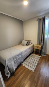 Postel nebo postele na pokoji v ubytování Cabañas Renova + 37 fotografií