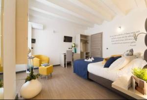 TV a/nebo společenská místnost v ubytování Palazzo Sisto Exclusive Rooms