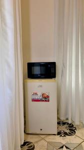 Kuchyň nebo kuchyňský kout v ubytování Backpackers Paradise