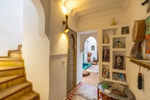 a hallway of a house with a stairway at Riad Chill&Relax Dar Tayri in Marrakech