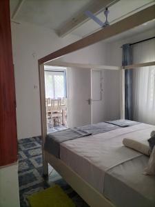 Postel nebo postele na pokoji v ubytování Backpackers Paradise