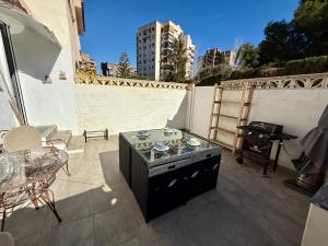 Gril dostupný pro hosty v apartmánu