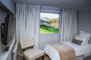 Postel nebo postele na pokoji v ubytování Hotel Lago Grey + 37 fotografií