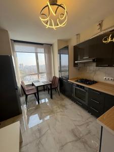 Η κουζίνα ή μικρή κουζίνα στο Vacay apartment +14 φωτογραφίες
