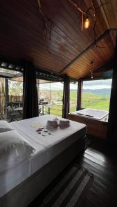 Imagen de la galería de Cabana na Árvore com vista para SERRA da Canastra, en São Roque de Minas