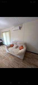 a white room with a mattress on the floor at Las andinas in Carmelo +9 photos
