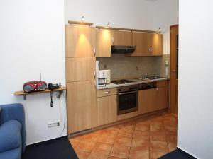 Η κουζίνα ή μικρή κουζίνα στο Apartment in fir with a balcony or a terrace