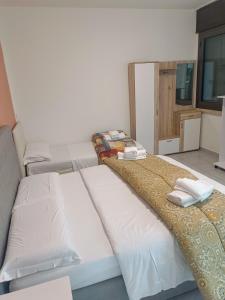Postel nebo postele na pokoji v ubytování Venice Apartments