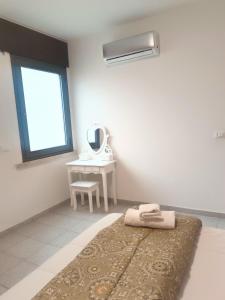 Postel nebo postele na pokoji v ubytování Venice Apartments