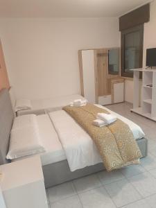 Postel nebo postele na pokoji v ubytování Venice Apartments