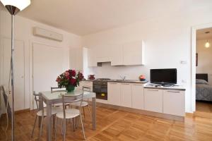 A kitchen or kitchenette at Romacentrarte