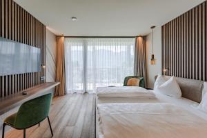A bed or beds in a room at VILLA NAJ