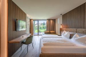 A bed or beds in a room at VILLA NAJ