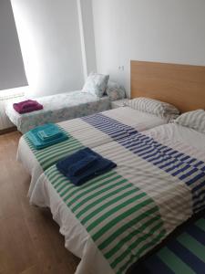 Postel nebo postele na pokoji v ubytování Tú casa en Aranda