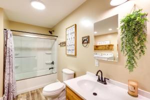 a bathroom with a shower toilet and a sink at Hike and Relax Blue Ridge Mountain Retreat! in Burnsville +20 photos