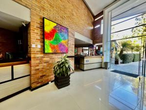 TV a/nebo společenská místnost v ubytování Hotel Toscana Oriente