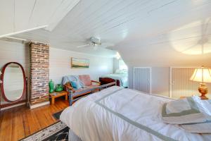 a bedroom with a large bed in a room at Cozy Augusta Home with Porch Walk to Katy Trail! in Augusta