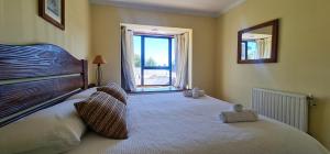 Postel nebo postele na pokoji v ubytování Hotel del Volcán