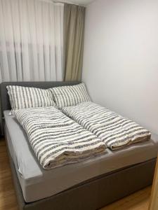 Postel nebo postele na pokoji v ubytování Haus Edelweiss