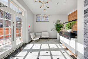 Posedenie v ubytovaní Apartments Waterlane Vintage & by Noclegi Renters